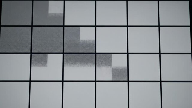 E ink style grayscale tiles switch between dithered patterns and waves