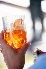Refreshing colorful cocktails served in glasses with straws, festive summer party drinks on catering table at celebration or holiday event
