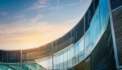 Fototapeta premium spider glazing system curtain wall in curve frame less glass facades modern office building tempered laminated glasses wall curtain wall abstract concept for architecture background