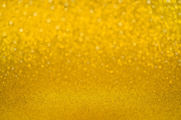 Glitter of golden lights defocused background