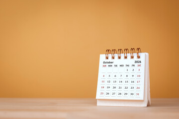 Calendar page October of the year 2026 on orange background. with copy space and business design....