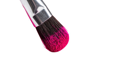 Fototapeta premium A close-up of a makeup brush featuring vibrant pink bristles.