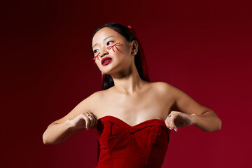 Fototapeta premium Creative makeup transformation showcasing beauty and artistic expression in studio