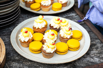 Cupcakes with a duck decoration and macarons, Brussels, Belgium