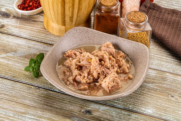 Canned tuna fish in the bowl