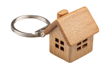 Miniature wooden house keychain.  Small, light-brown wooden house-shaped keychain with metal ring.  Simple, detailed craftsmanship.  Isolated on white background