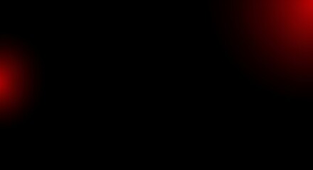 Dynamic red gradient light flare effect on deep black background for dramatic abstract design
