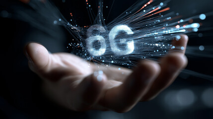 6G. Data Speed. Quantum Communication. A glowing hologram of 6G text floating above a hand, showcasing modern technology and innovation.