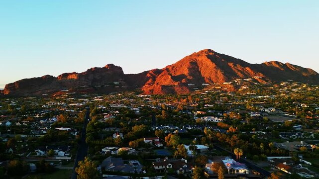 Camelback Mountain at Sunset Drone in Phoenix Arizona Scottsdale View with Blue Sky and Sun