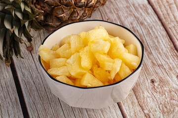 Sweet canned pineapple fruit pieces