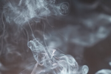 Ephemeral Whispers: Swirling smoke in ethereal form, creating a sense of mystery and transience with flowing wisps and delicate textures.