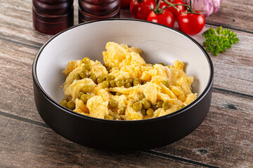 Scrambled egg omelet with green peas