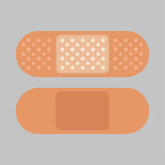 Two Adhesive Bandages Close-up Shot of Band-aids Against a Gray Background