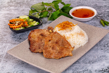 Roasted pork steak with rice