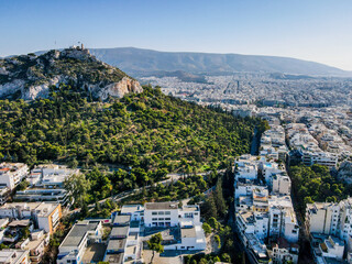 Aerial landscape from ancient Lycabettus Hill monument winter sunset Mediterranean Athens