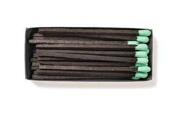 top view green matchbox on a white background at horizontal composition