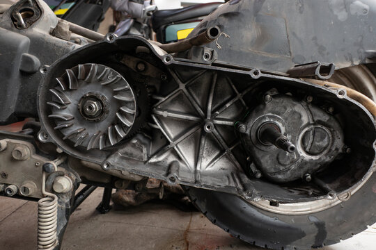 an exposed moter CVT system showing the variator and clutch assembly with the drive belt removed for maintenance or inspection