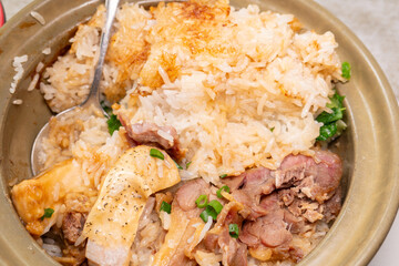 claypot rice with preserved duck and fish belly at horizontal composition