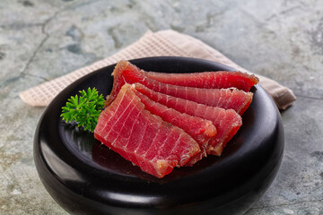 Raw red tuna sashimi slices