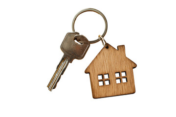 Metal key attached to a wooden house keychain