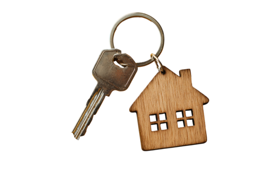 Metal key attached to a wooden house keychain