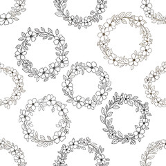 Obraz premium Seamless pattern of floral wreaths with delicate flowers and leaves on white, patern seamless, Stock royalty image.