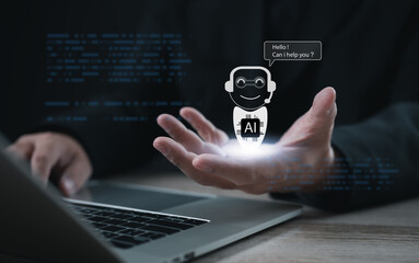 Entrepreneur presenting AI chatbot assistant hologram with conversation bubble above laptop. Concept of artificial intelligence, digital innovation, customer support, and future virtual technology.