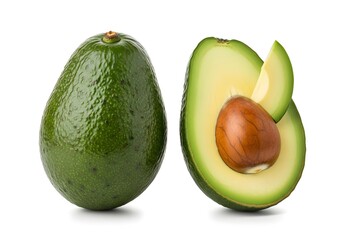 Fresh avocados on a white background showing the seed and the sliced avocado fruit close up view
