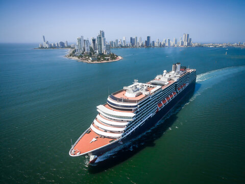 Aerial drone view of a luxury cruise ship departing Cartagena de Indias, Colombia