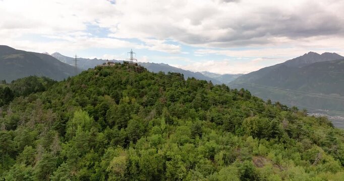 Drone view over Etschtal toward Merano with St Hippolyt church