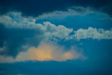 Sky sights, Sunlight behind dark blue thunderclouds