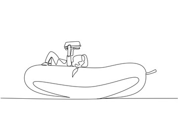 Fototapeta premium Single continuous line drawing girl reading on cucumber. Read the legend of the cucumber and the mouse deer. The nerd. Girl Reading Book at Vegetables and Fruits. One line design vector illustration