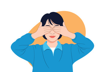 Young woman covering her eyes with both hands showing playful expression