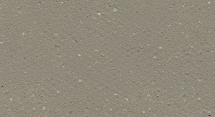 A close-up, textured view of a speckled beige surface, possibly a countertop or wall material.