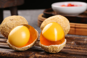 Loose Eggs Made in Henan Province - Lead-free Chinese Preserved Eggs with Golden Yolks on Wooden Table
