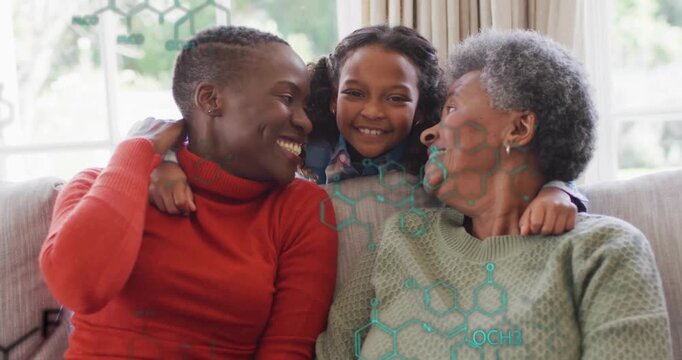 three-generation family sharing bonding moment on couch while science graphics appearing and fading