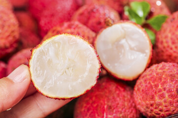 Fresh Chinese Lychee Fruit from Guangxi Hainan Showing White Flesh Inside Red Skin