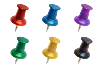 Six colorful push pins in red blue purple green yellow and black arranged in two rows on a black background
