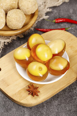 Traditional Golden Tea Eggs with Star Anise on Wooden Board - Asian Preserved Food