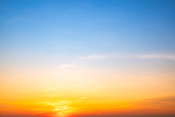 Beautiful , luxury soft gradient orange gold clouds and sunlight on the blue sky perfect for the background, take in evening,Twilight, Large size, high definition landscape photo