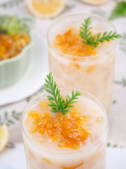 Tropical Pineapple Milkshakes with Rosemary Garnish - Refreshing Summer Drinks