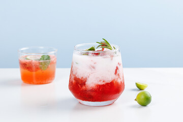 Fresh Strawberry Summer Cocktails with Ice and Herbs Garnish
