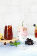 Fresh Summer Grape Cocktails with Mint Garnish and Cooling Beverages for Leisure Time