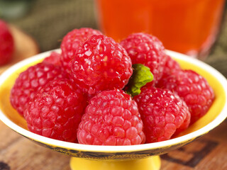 Fresh Red Raspberries in Yellow Bowl - Healthy Organic Berry Fruit Close-Up