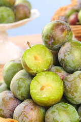 Fresh Sweet Green Plums on Display Shelves - Crisp Juicy Stone Fruit