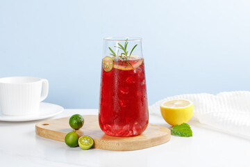 Fresh Summer Berry Cocktail with Herbs and Citrus on White Table