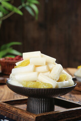 Pickled Spicy Lotus Roots with Chilli Peppers Sliced in Traditional Bowl Asian Cuisine