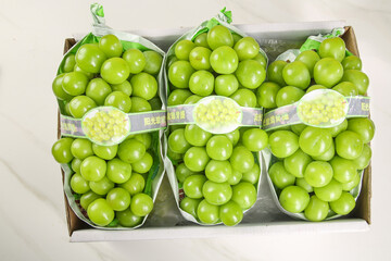 Fresh Green Grapes in Retail Packaging Ready for Market Sale
