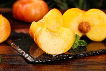 Fresh Shandong Peaches with Golden Flesh on Slate Board - Healthy Organic Fruit Display