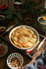 Asian Wide Flat Noodles in Hot Savory Broth with Spices Traditional Cuisine Bowl